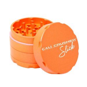 Orange Cali Crusher OG Slick 4-Part Nonstick Grinder with ceramic coating, magnetic lid and stainless steel screen. Made from Anodized 6061-T6 aerospace aluminum.