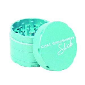 Teal Cali Crusher OG Slick 4-Part Nonstick Grinder with ceramic coating, magnetic lid and stainless steel screen. Made from Anodized 6061-T6 aerospace aluminum.