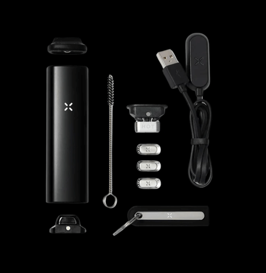 Here is a black Pax Plus Portable dry herb vapes with all the included accessories.
